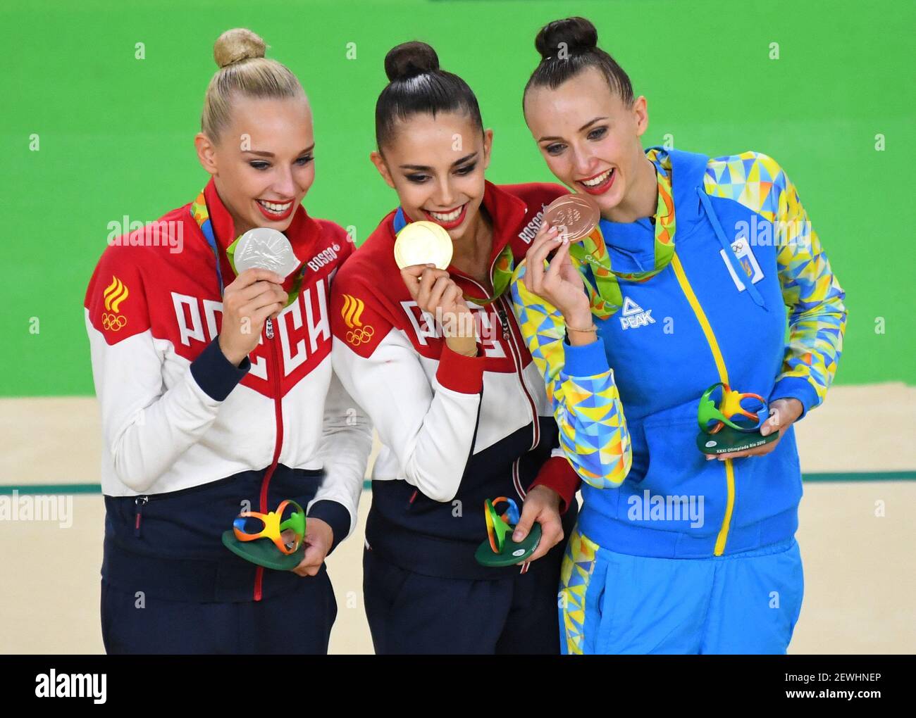 Rio De Janeiro Brazil Margarita Mamun Rus Yana Kudryavtseva Rus And Ganna Rizatdinova Ukr On The Podium After The Women S Rhythmic Gymnastics Individual All Around Final During The Rio 16 Summer Olympic