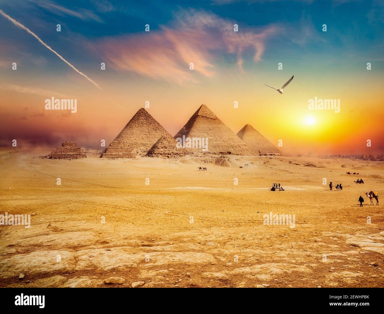 Egyptian pyramids in sand desert and clear sky. Stock Photo