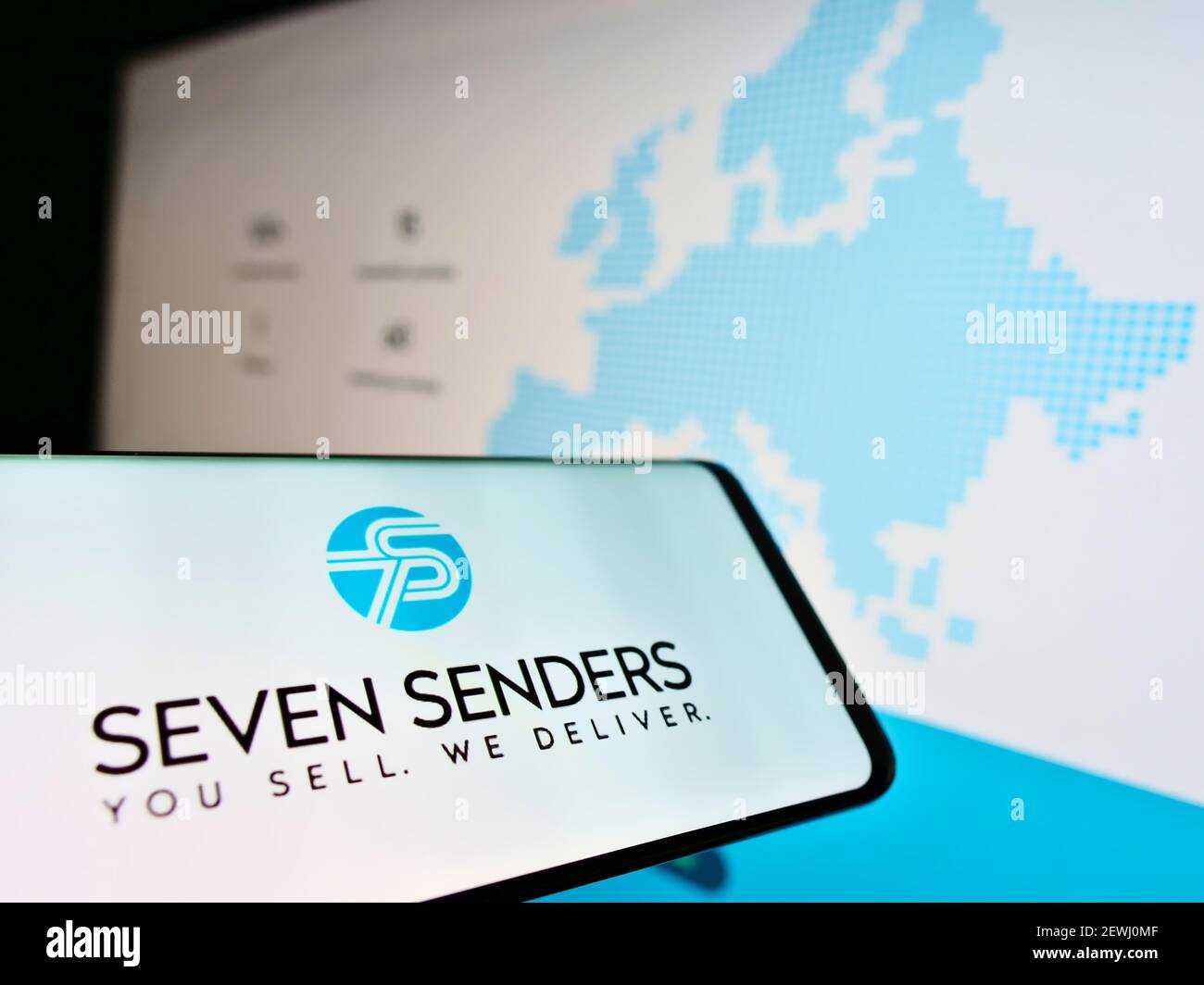 Cellphone with logo of German delivery platform Seven Senders GmbH on screen  in front of business webpage. Focus on center of phone display Stock Photo  - Alamy