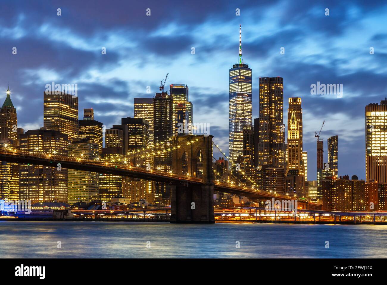New York City skyline night Manhattan town Brooklyn Bridge World Trade Center travel. Stock Photo