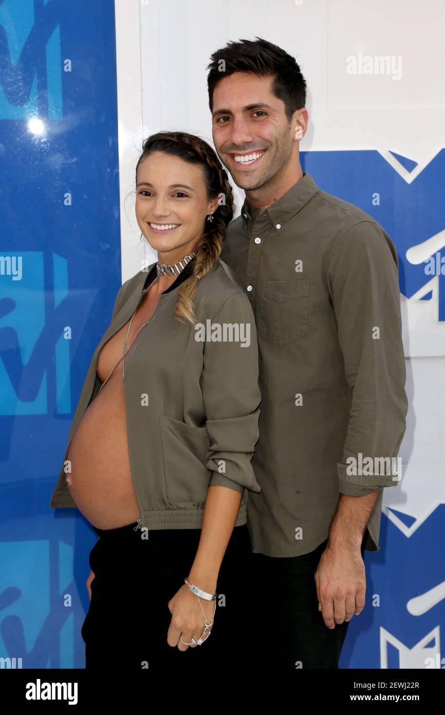Laura Perlongo, left, and Nev Schulman arrive at the 2016 MTV Video
