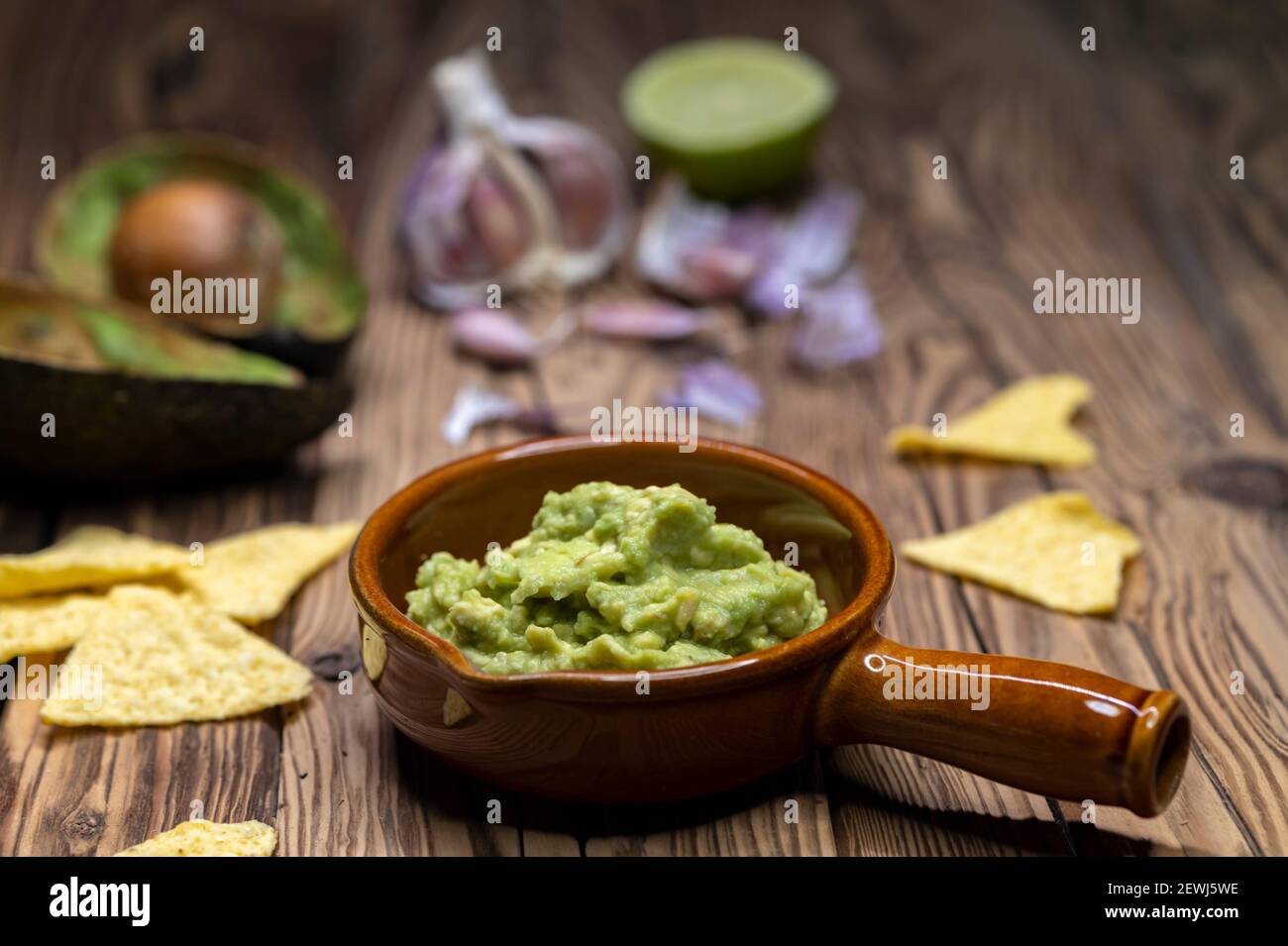 avocado dip flavored with garlic, chili, pepper, and lime juice with