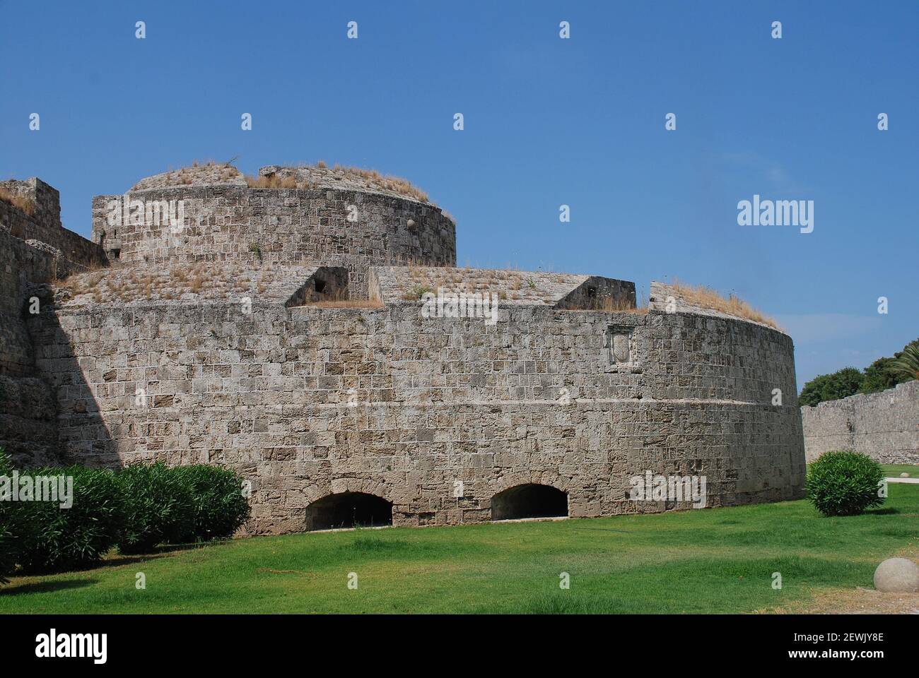 The medieval fortified wall surrounding the Old Town on the Greek island of Rhodes. Stock Photo