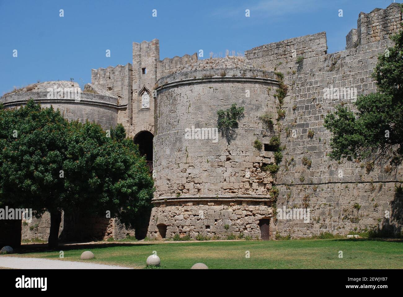 The medieval fortified wall surrounding the Old Town on the Greek island of Rhodes. Stock Photo
