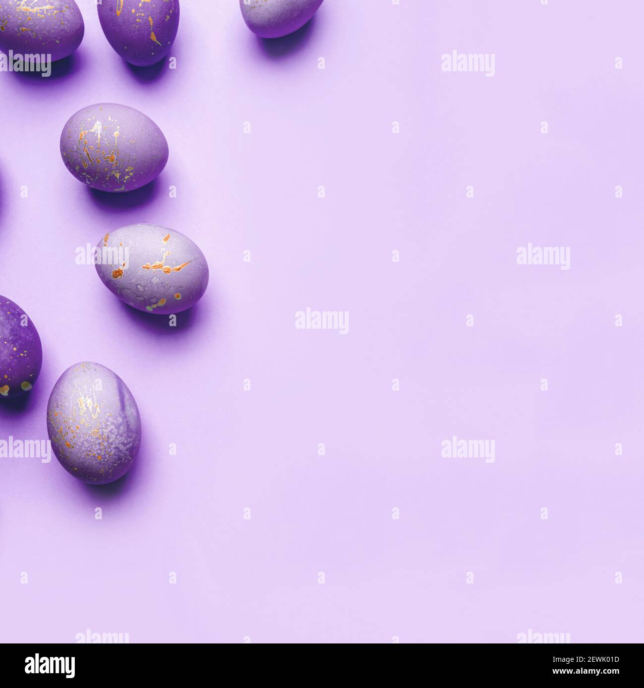 Easter frame of eggs painted in purple color Stock Photo - Alamy