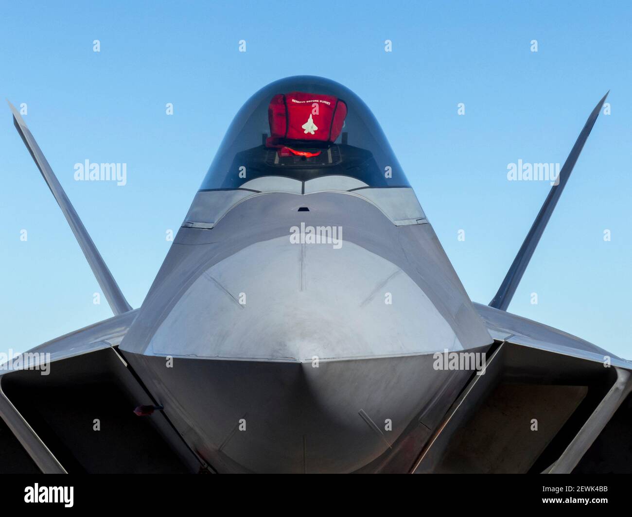 The Lockheed Martin/Boeing F-22 Raptor is a single-seat, twin-engine fifth-generation supermaneuverable fighter aircraft that uses stealth Stock Photo