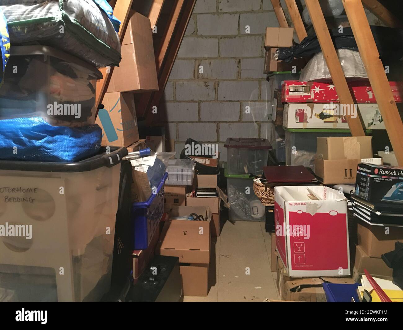 One end of a loft full of 'stuff'. Stock Photo