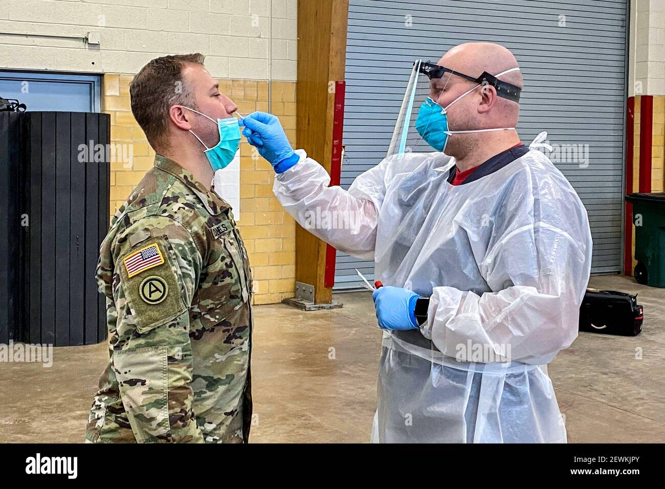 Master Sgt. Derek Daniels of the Minnesota Air National Guard receives a COVID-19 nasal swab test at the Hibbing National Guard Armory on November Stock Photo
