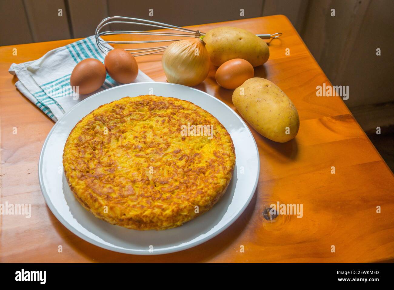 Spanish omelet with ingredients. Still life Stock Photo Alamy