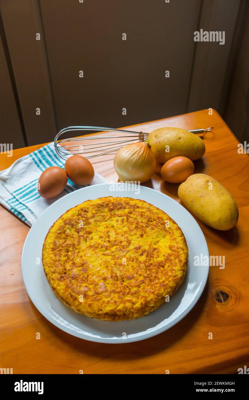 Spanish omelet with ingredients. Still life Stock Photo Alamy