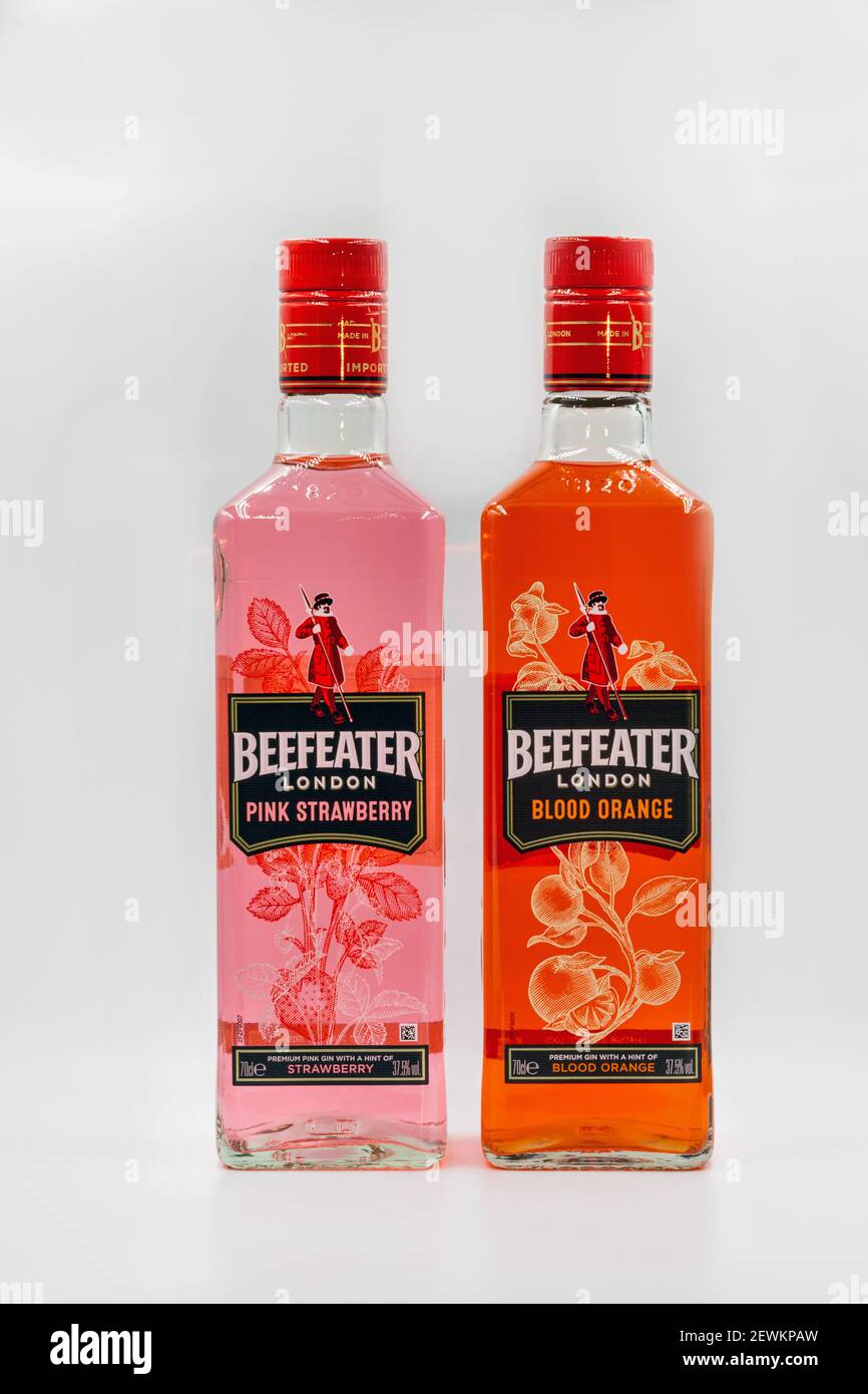 KYIV, UKRAINE - DECEMBER 16, 2020: Beefeater London Pink Strawberry and  Blood Orange premium gin bottles closeup against white background. Gin is a  di Stock Photo - Alamy