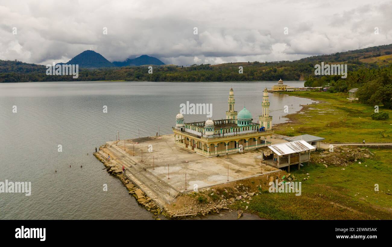 Mosque on the shore of lake Lanao view from above. Mindanao, Lanao del Sur, Philippines. Stock Photo