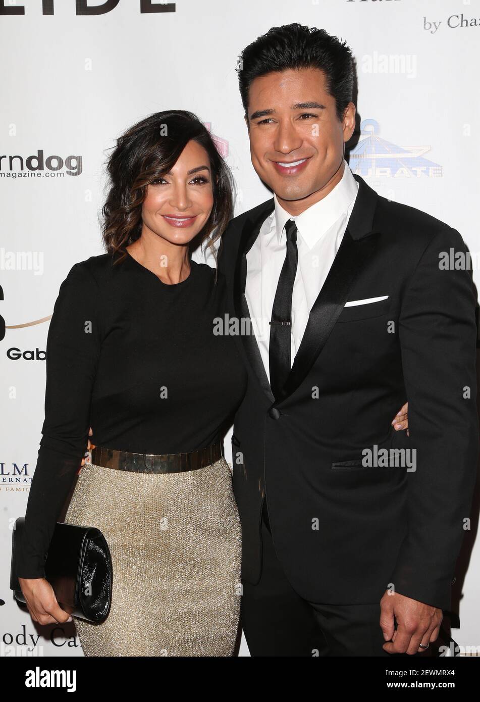 Courtney Laine Mazza, Mario Lopez attending Vanderpump Dogs Foundation