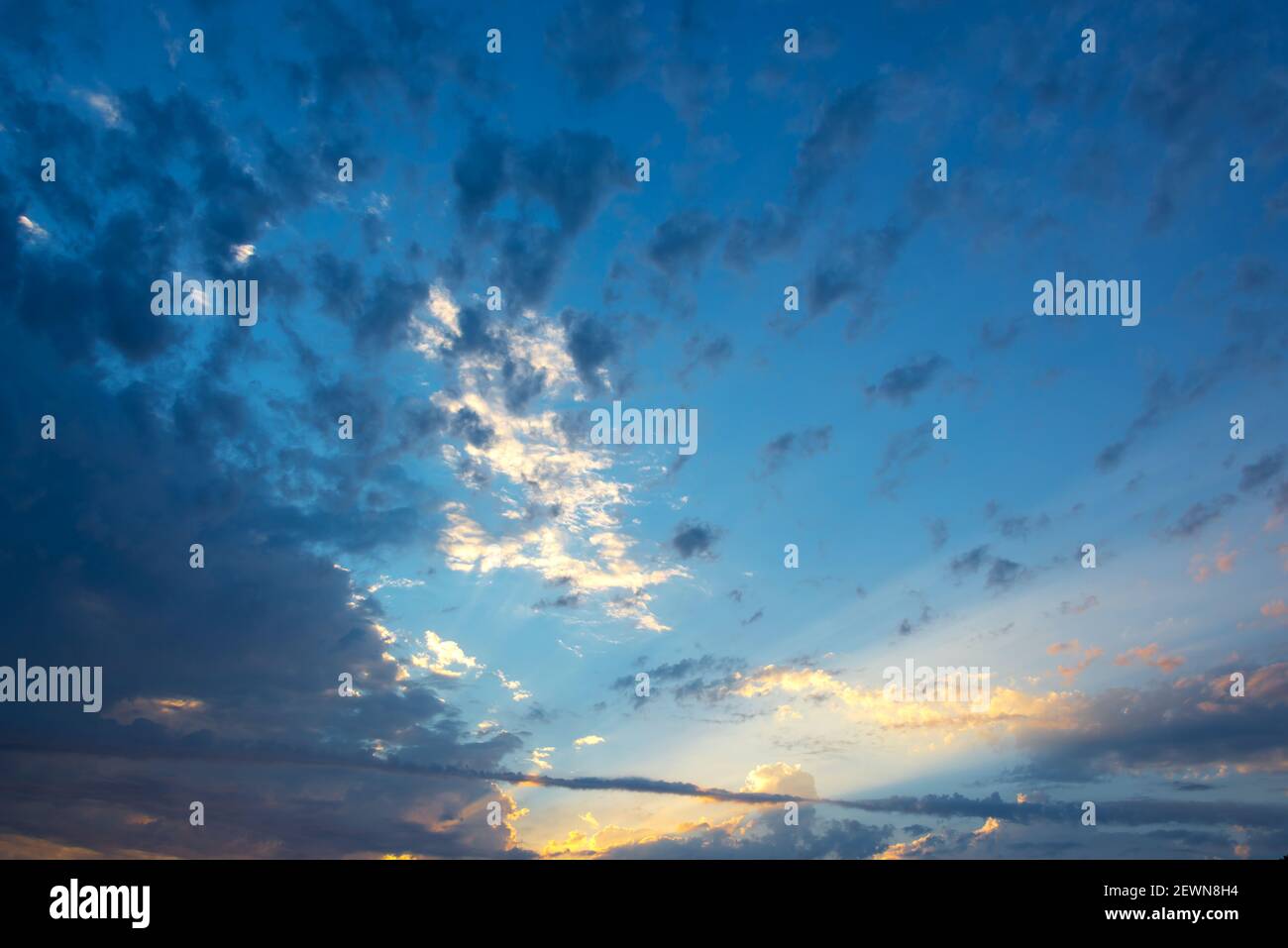 Colorful sky with clouds at sunset, nature background Stock Photo - Alamy