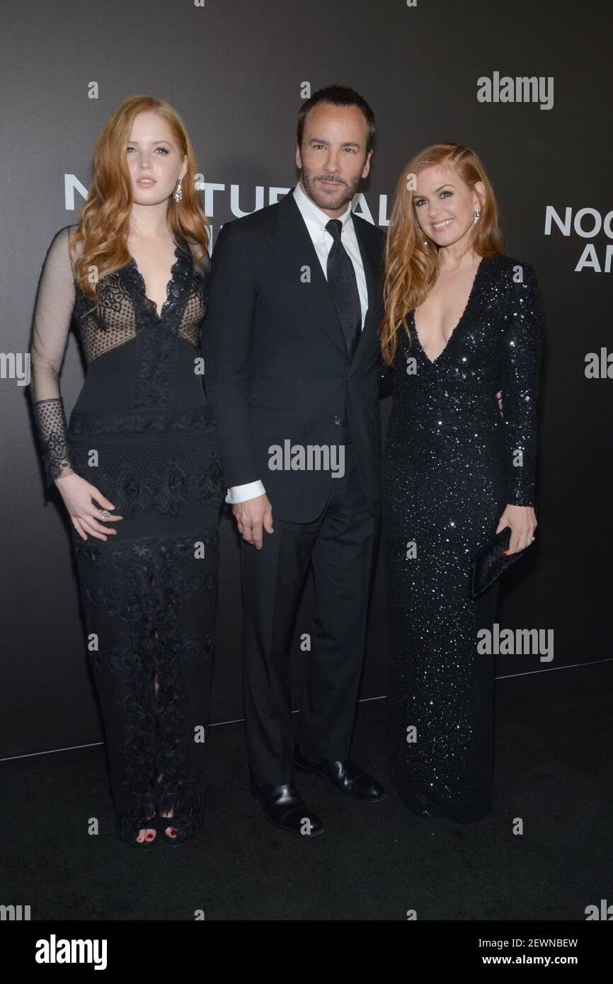 L-R) Ellie Bamber, Director Tom Ford and Isla Fisher attend the 