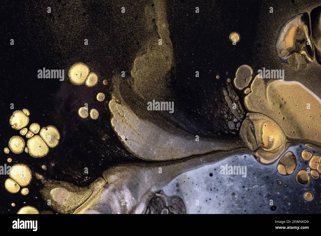 Abstract fluid art background black and golden colors. Liquid acrylic ...