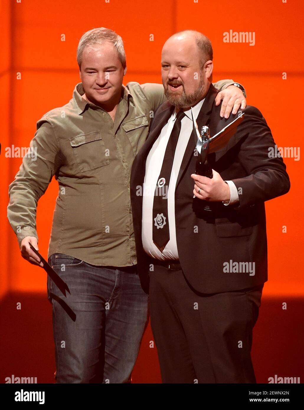 LOS ANGELES, CA - DECEMBER 1: Aaron Greenberg (R) accepts the Best Sports/Racing Game award for "Forza Horizon 3" from Vince Zampella onstage at The Game Awards 2016 at the Microsoft Theater on December 1, 2016 in Los Angeles, California. (Photo by Frank Micelotta/PictureGroup) *** Please Use Credit from Credit Field *** Stock Photo