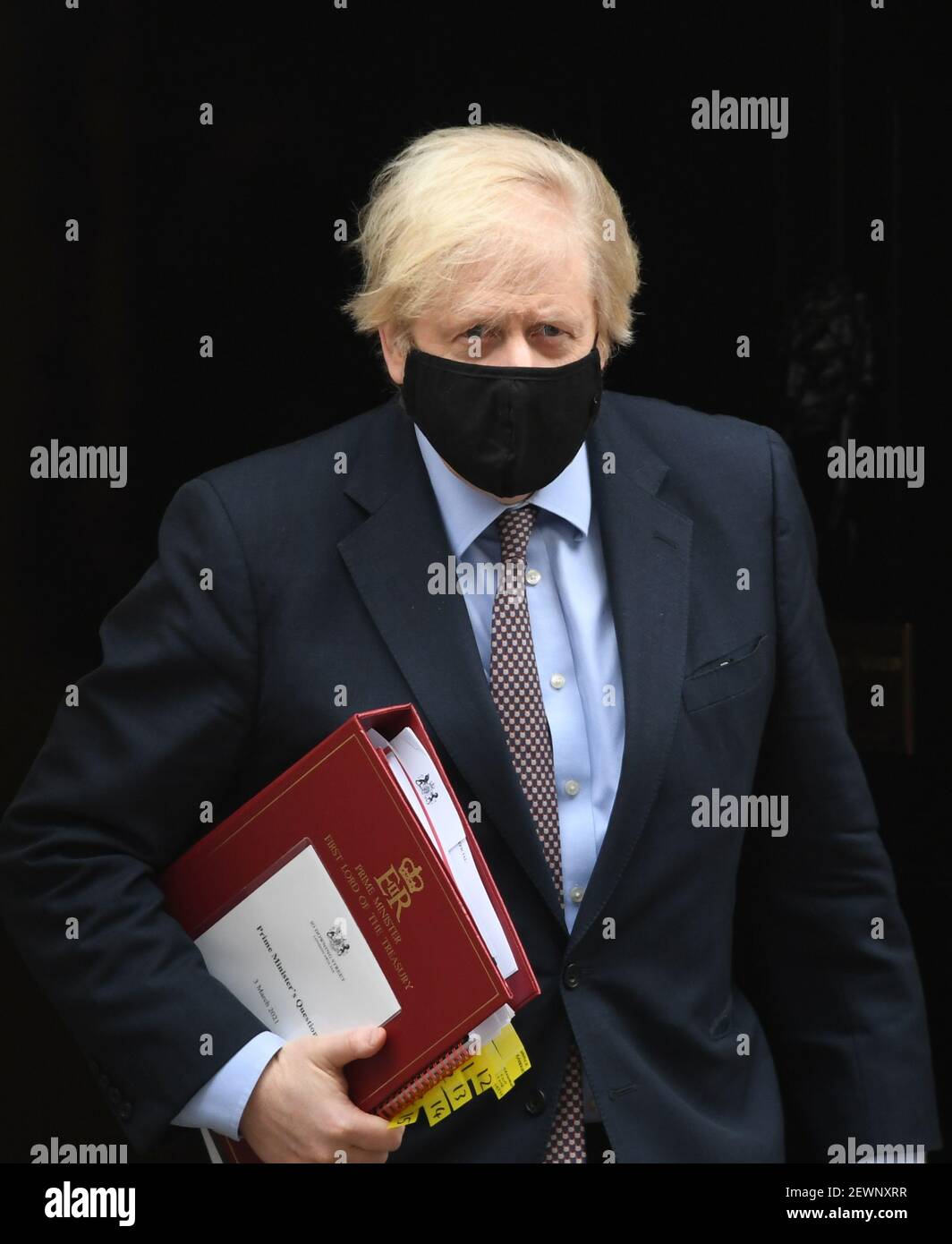 Prime Minister Boris Johnson leaves 10 Downing Street to attend Prime Minister's Questions at the Houses of Parliament, London. Picture date: Wednesday March 3, 2021. Stock Photo