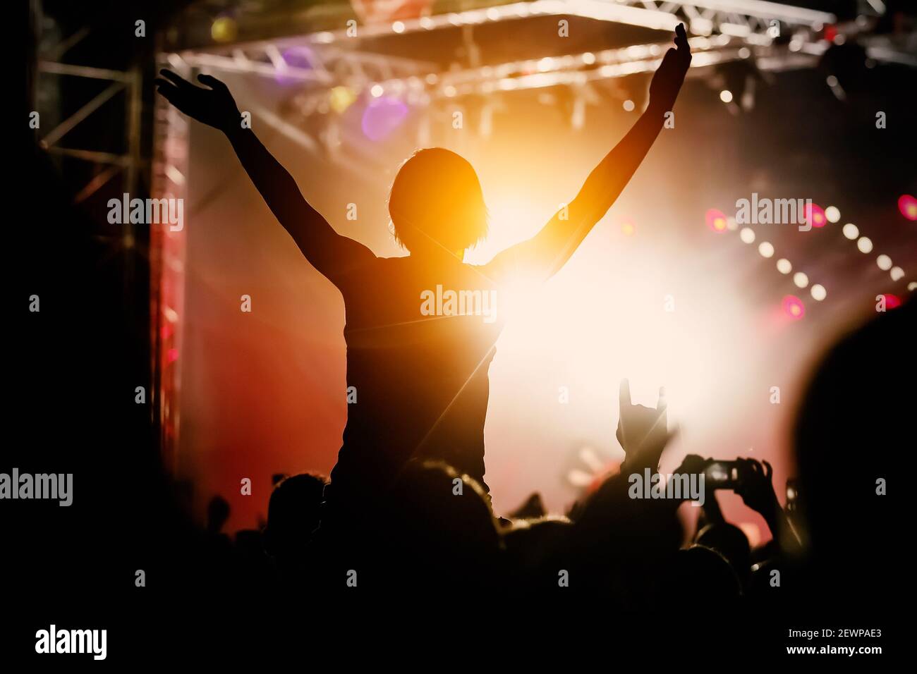 Concert crowd arms sunset hi-res stock photography and images - Alamy