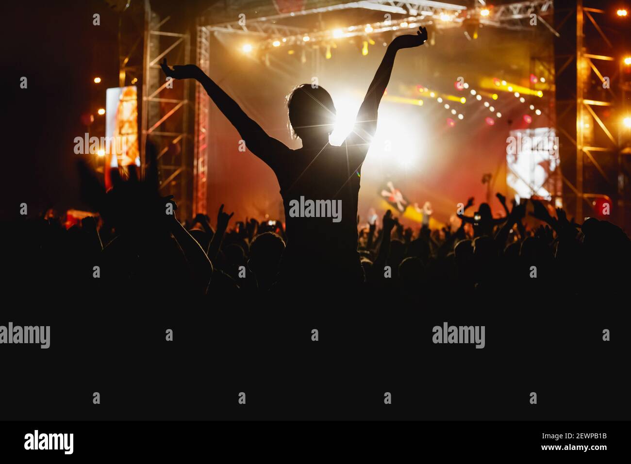 Concert crowd arms sunset hi-res stock photography and images - Alamy
