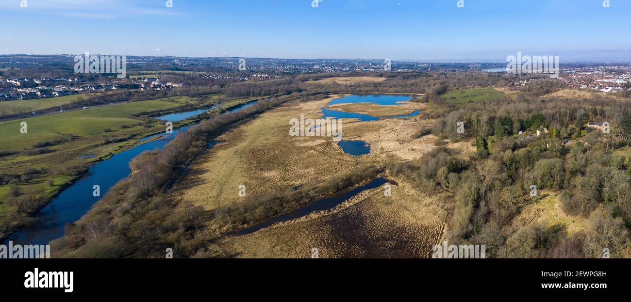 Aerial view of the River Clyde flowing past Dalzell Estate country park and RSPB Baron's Haugh Nature reserve near Motherwell, North Lanarkshire,. Stock Photo