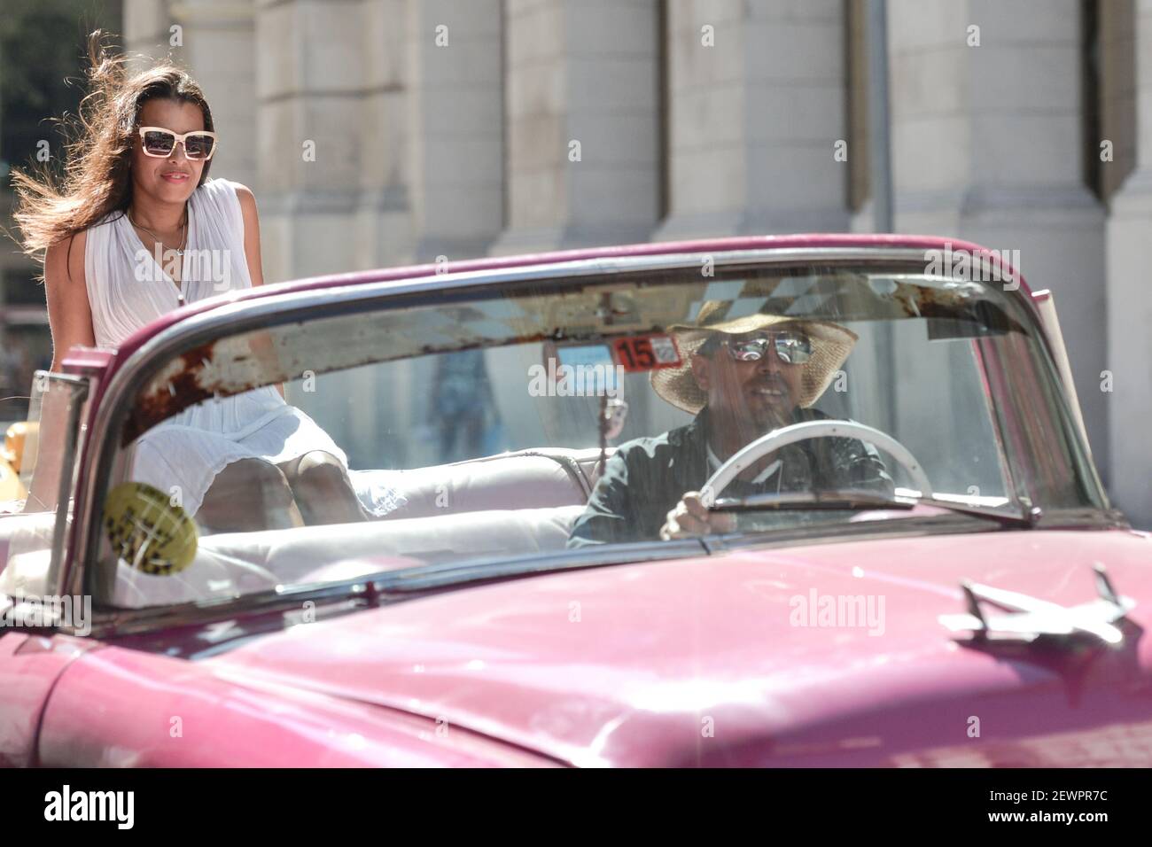 A tourist enjoys a ride inside an old american car, in Havana's city center. On Thursday, 1 December 2016, in Havana, Cuba. Photo by Artur Widak *** Please Use Credit from Credit Field ***  Stock Photo