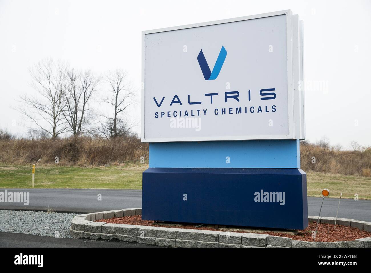 A logo sign outside of a facility occupied by Valtris Specialty