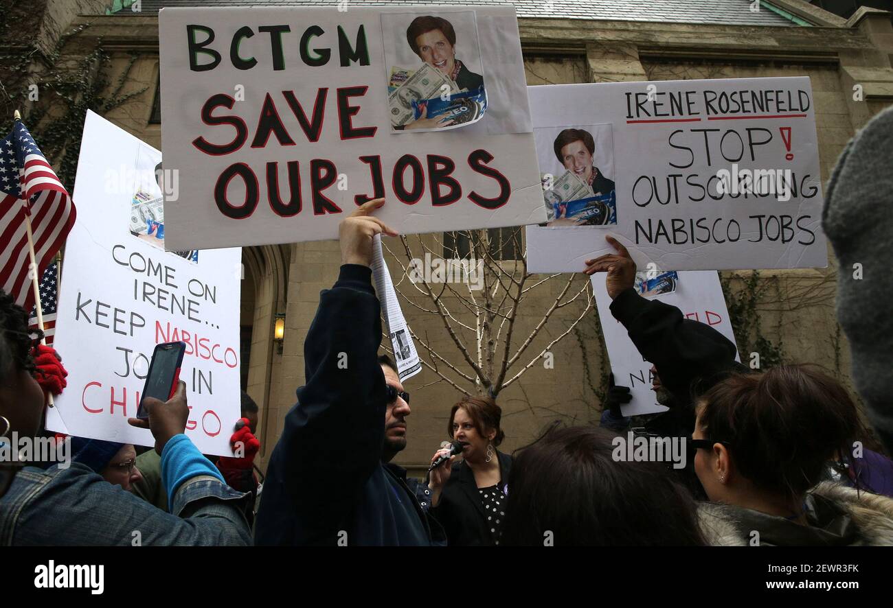 Dozens of people protest Nabisco job cuts outside a Chicago hotel where