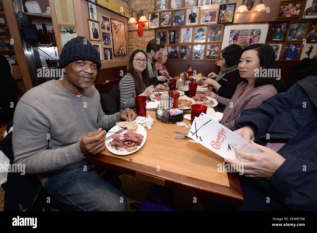 Scott Outen (left), from Maryland, eats a 