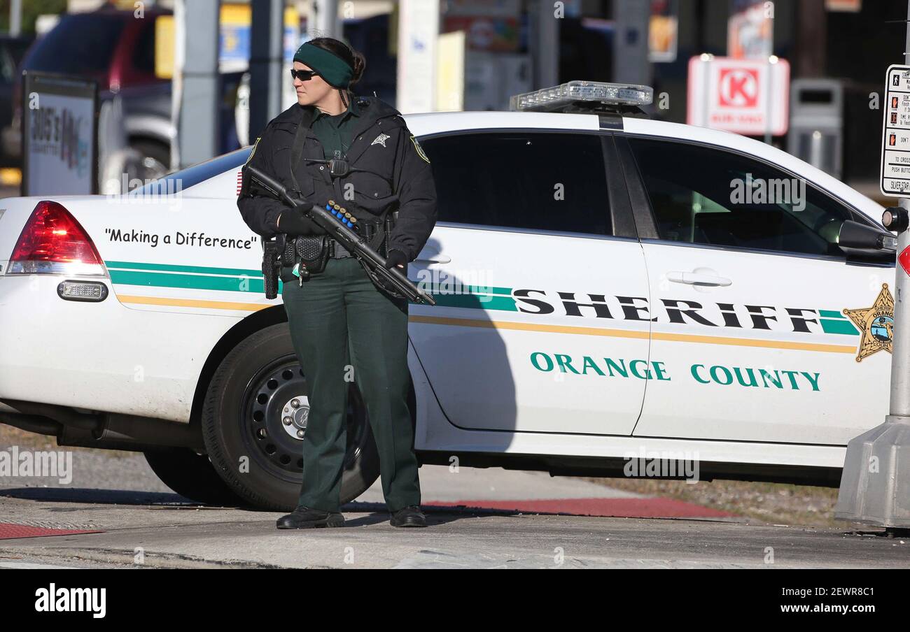 Orange County Sheriff deputies secure a perimeter at John Young Parkway