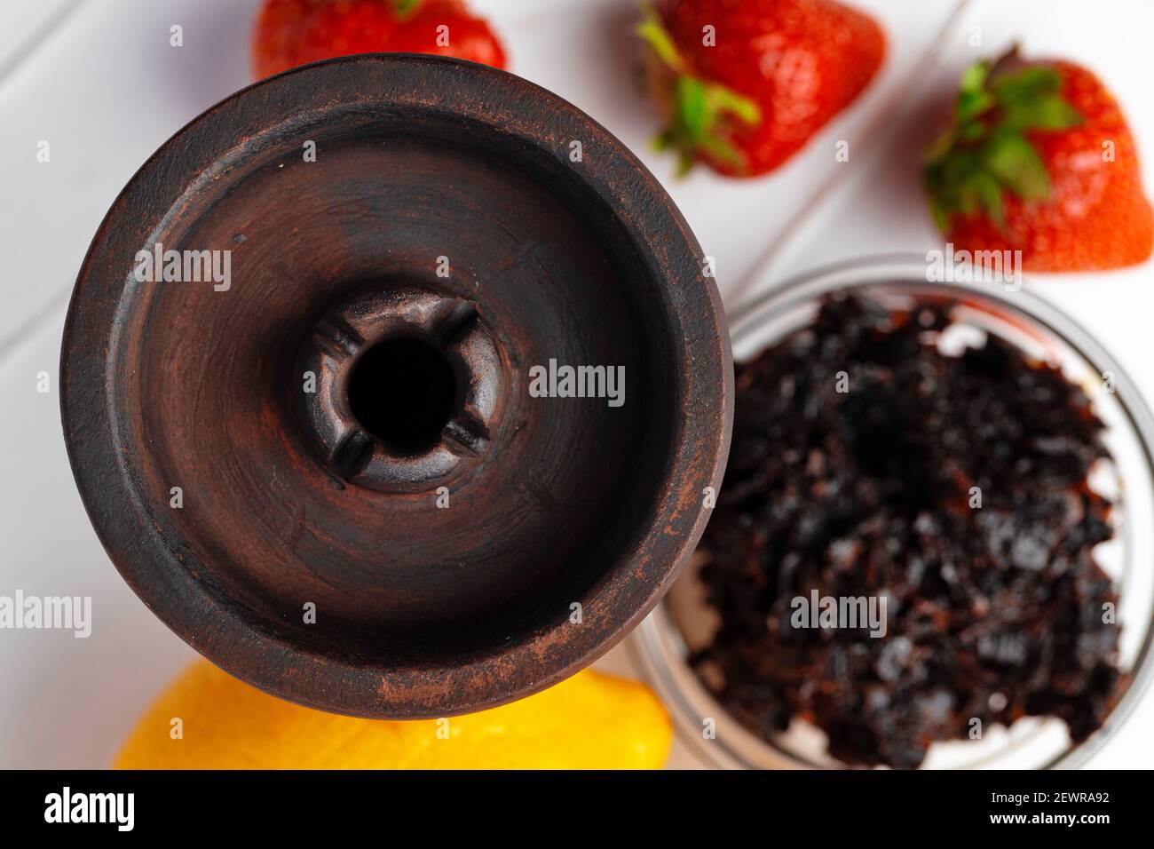 Empty hookah shaft close up on table with fresh fruit Stock Photo