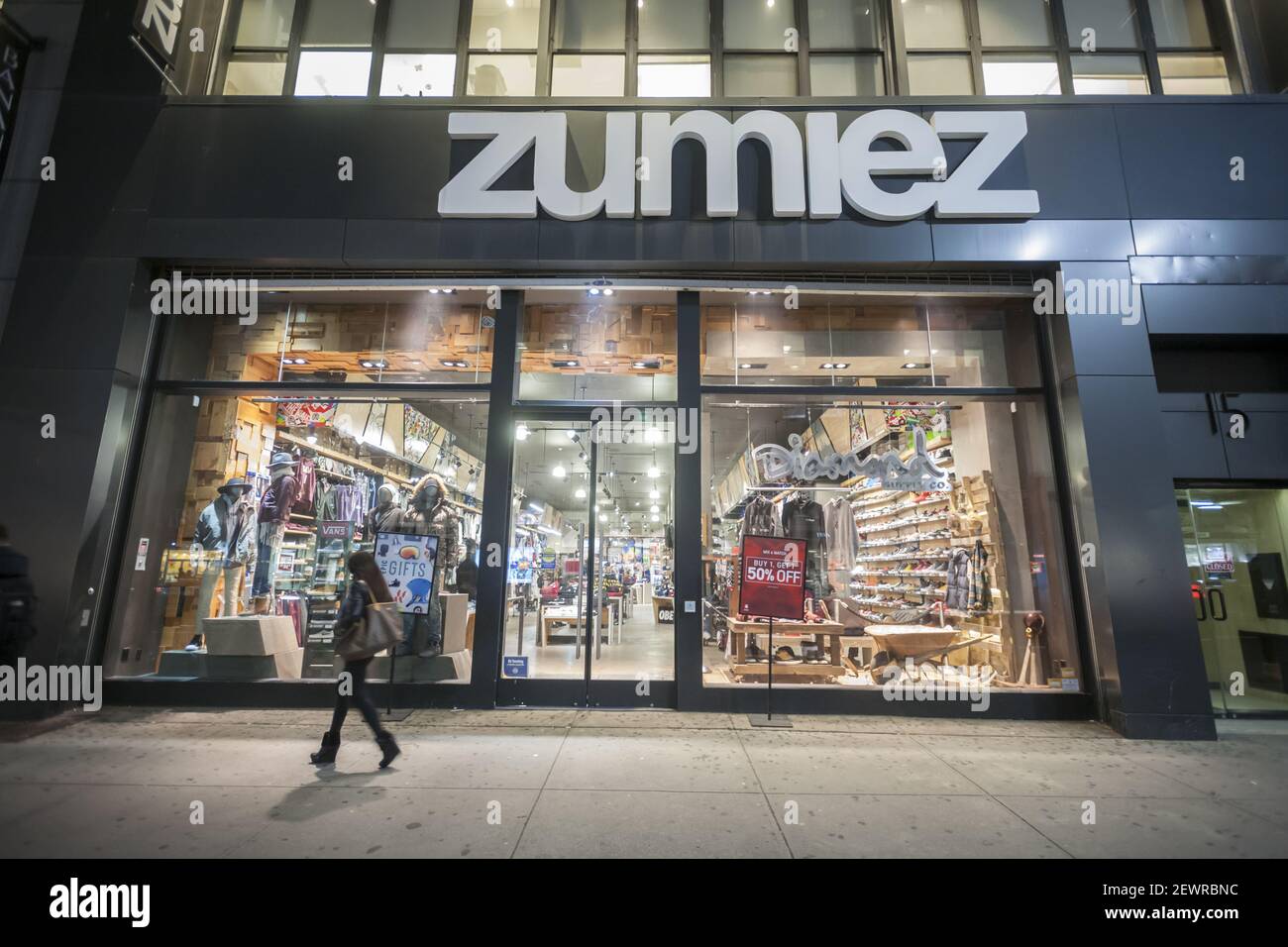 Shoppers pass a Zumiez store in Herald Square in New York on Tuesday