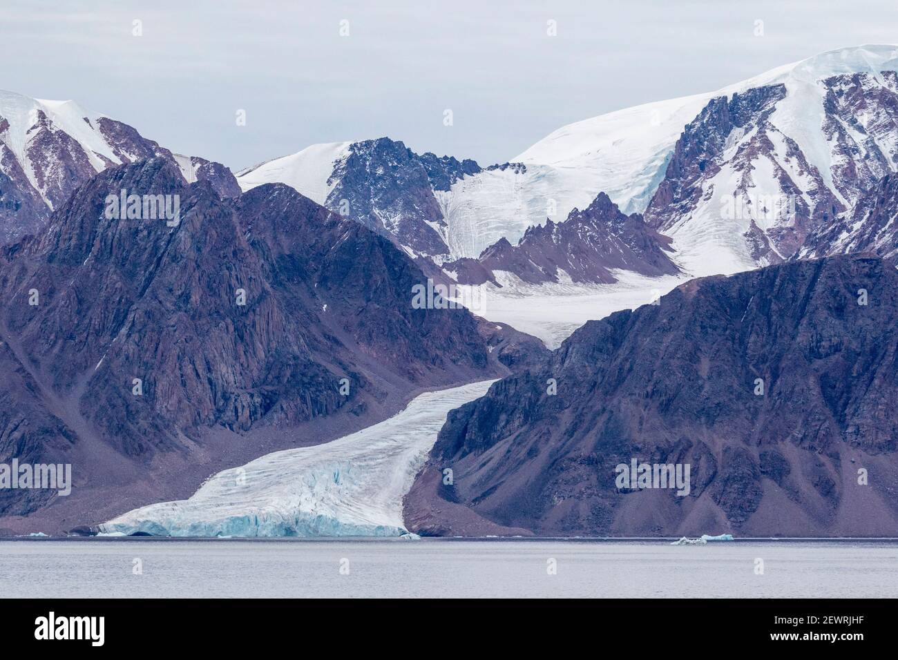 Tidewater glacier in the calm waters of Makinson Inlet, Ellesmere Island, Nunavut, Canada, North America Stock Photo