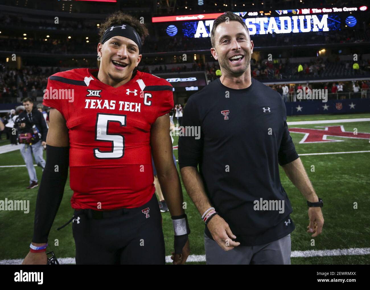 Texas Tech quarterback Patrick Mahomes II (5) and head coach Kliff Kingsbury walk off the field after after a 54-35 win against Baylor at AT&T Stadium in Arlington, Texas, on Friday, Nov. 25, 2016. (Photo by Richard W. Rodriguez/Fort Worth Star-Telegram/TNS/Sipa USA) Stock Photo