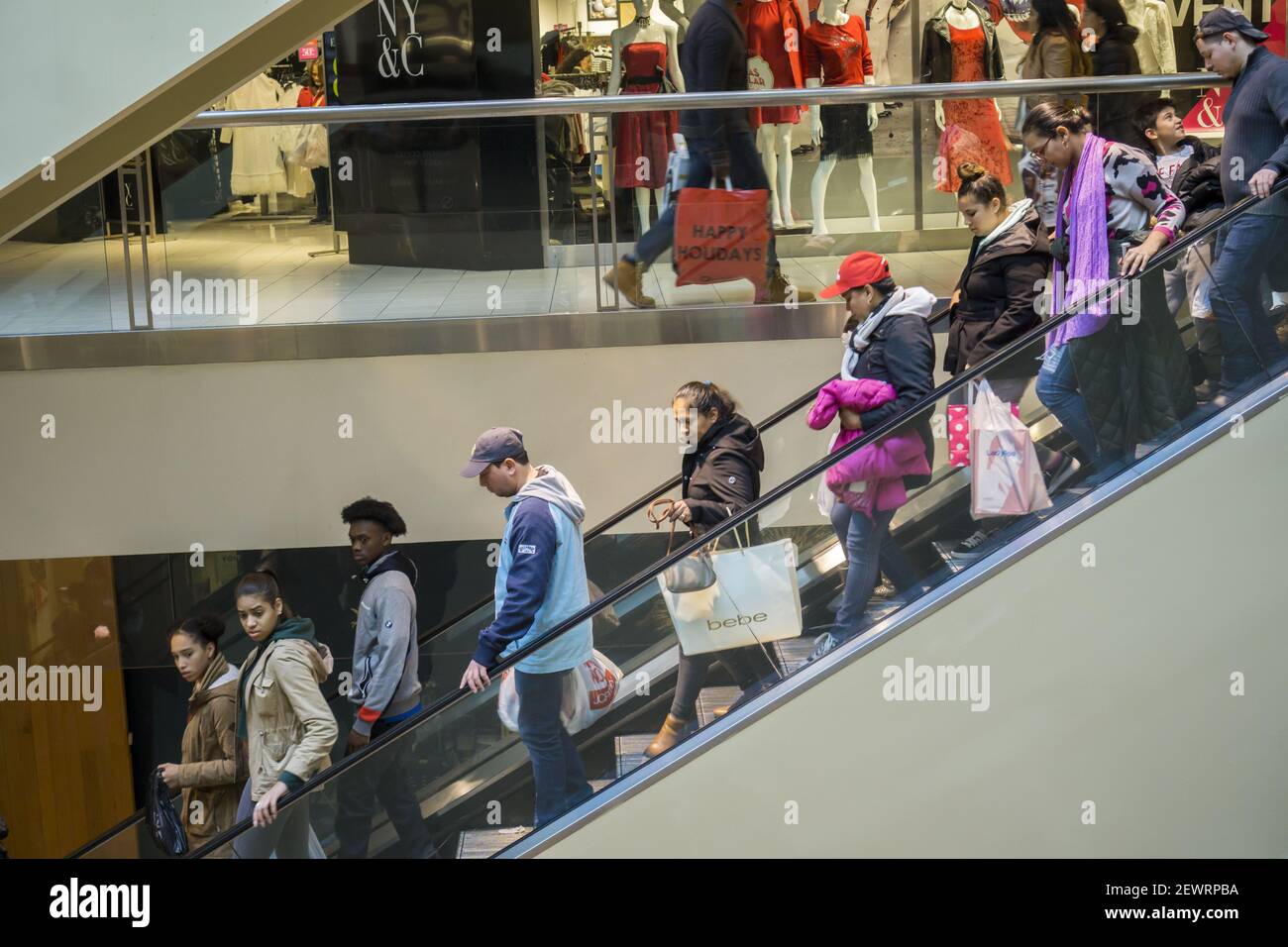 Hordes of last minute shoppers crowd the Queens Center Mall in the borough  of Queens in New York on Christmas Eve, Saturday, December 24, 2016. L  Brands is to report its December