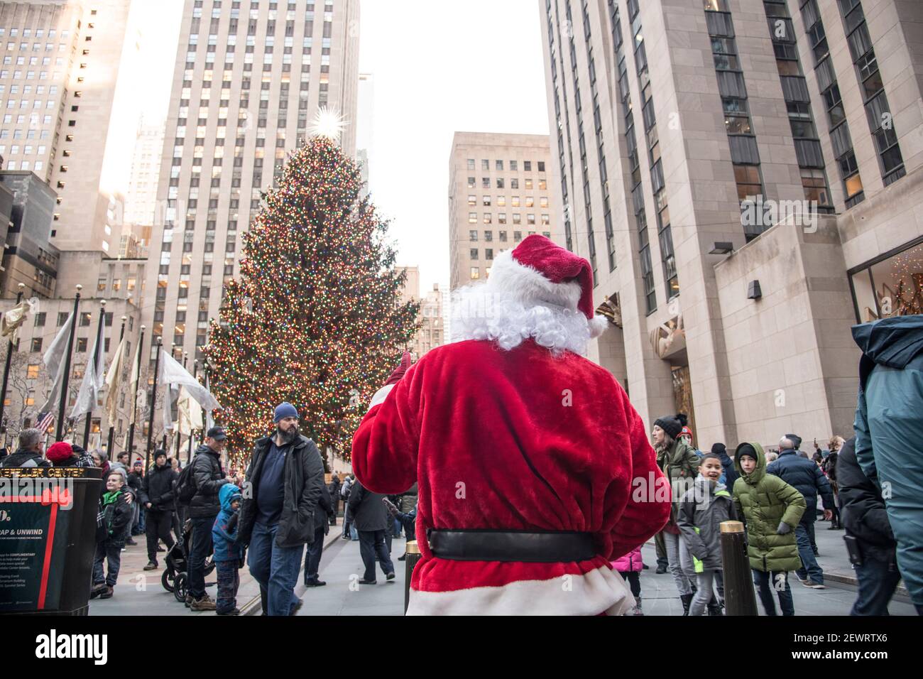 Santa Claus at the Rockefeller Square Christmas tree, Manhattan, New York City, New York, United States of America, North America Stock Photo