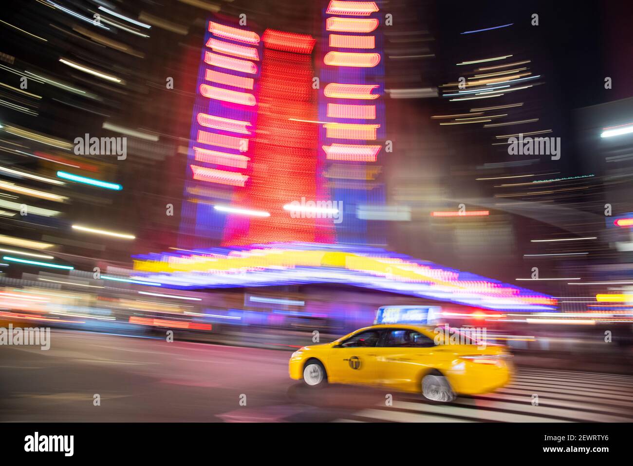 Taxis blurring down a street in Manhattan, New York City, New York, United States of America, North America Stock Photo