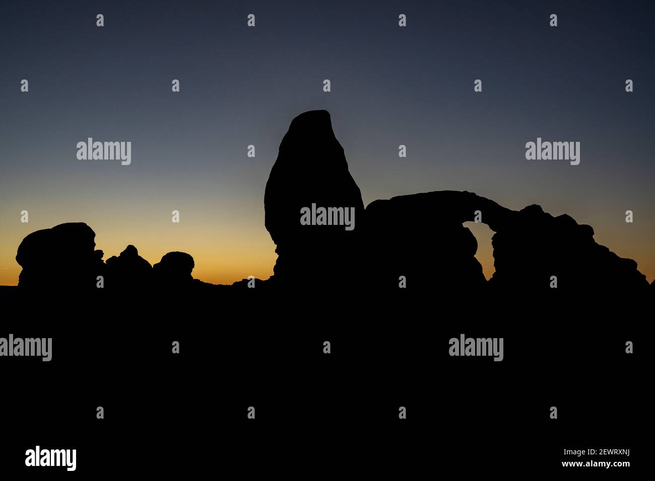 Silhouette of Turret Arch at sunset, Arches National Park, Utah, United States of America, North America Stock Photo