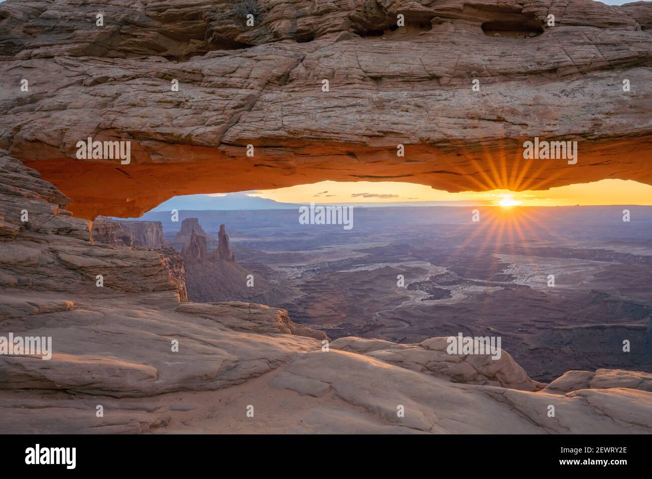 Close up view of canyon through Mesa Arch at sunrise, Canyonlands National Park, Utah, United States of America, North America Stock Photo