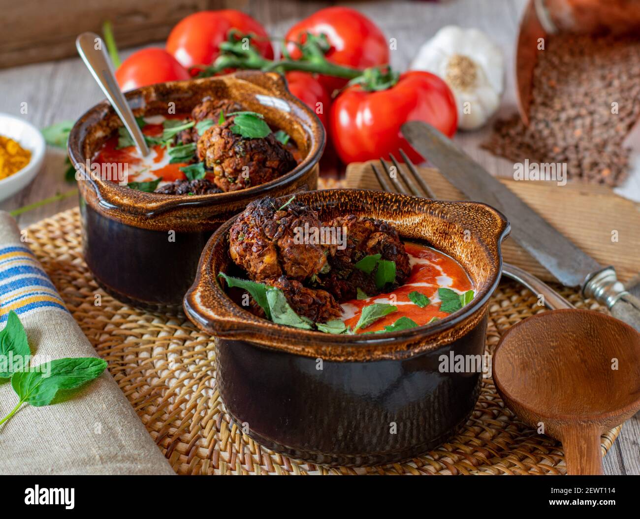 vegan meat dish with lentil nut meatballs and spicy arabian tomato soup