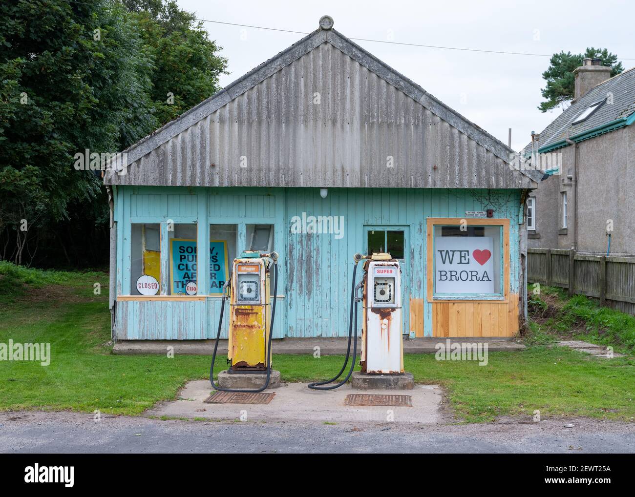 An old, long abandoned petrol station in the town of Brora, Sutherland, Scotland, UK. Stock Photo