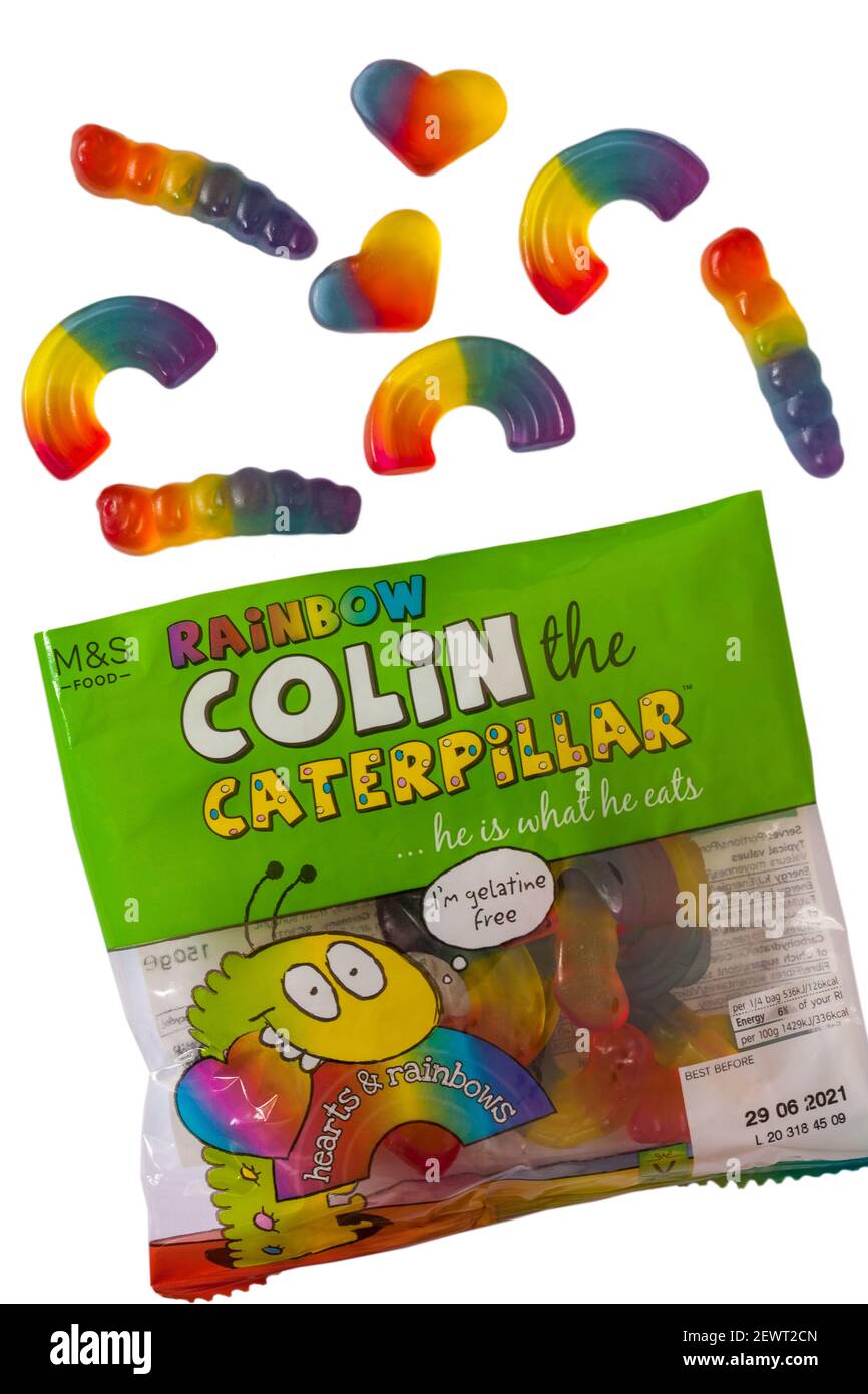 packet of M&S Rainbow Colin the Caterpillar sweets opened with contents spilled set on white background - he is what he eats - hearts & rainbows Stock Photo