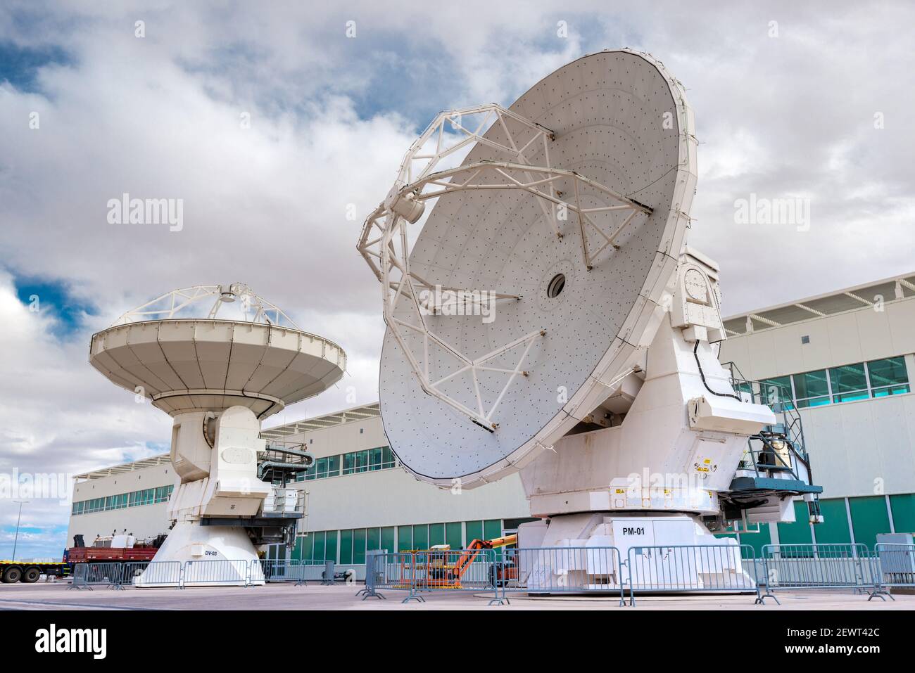 San Pedro de Atacama, Atacama Desert, ALMA Base Camp, Chile – ALMA Base Camp infrastructure and machinery with large radio telescopes. Stock Photo