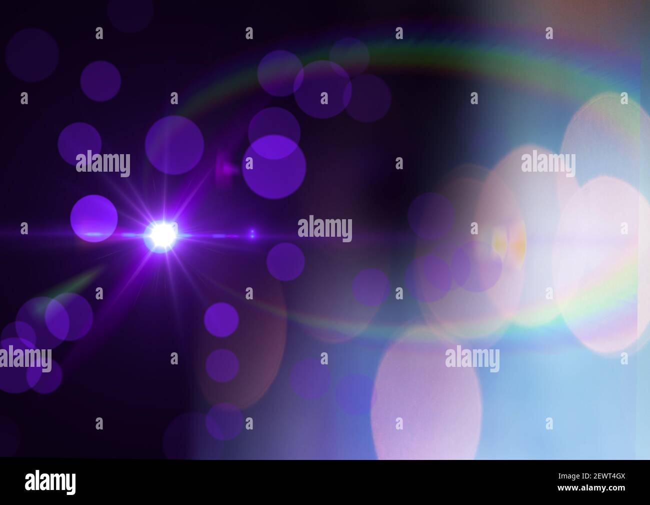 Glowing purple spot of light with purple spots and prism in background Stock Photo