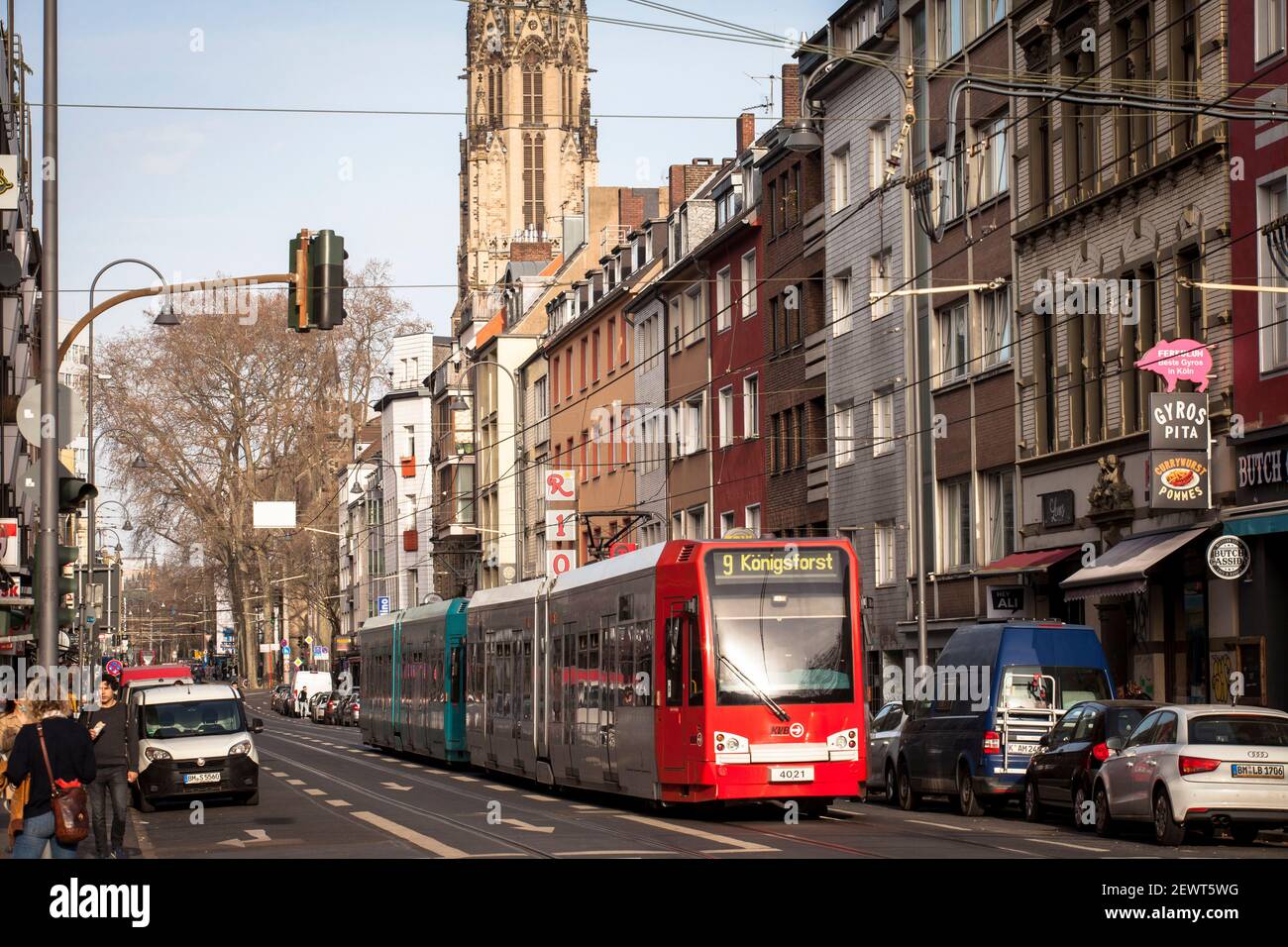 tram of line 9 on Zuelpicher street, student quarter Quartier Latin, church Herz Jesu, Cologne, Germany.  Strassenbahn der Linie 9 auf der Zuelpicher Stock Photo