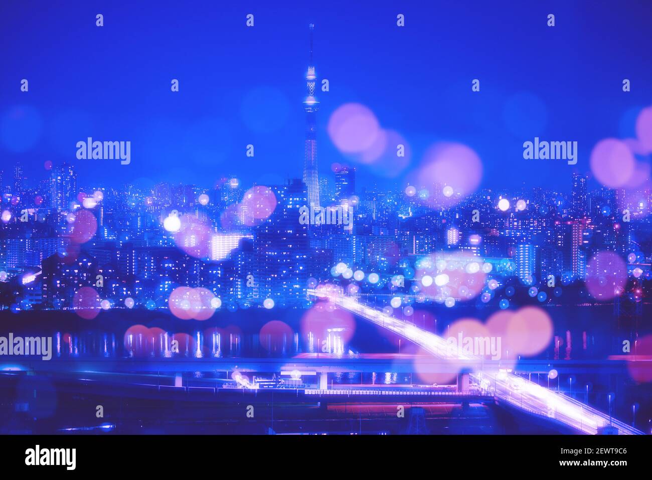 Nightlife Background in Tokyo. Tokyo Skyline with Blur Bokeh Lights Decoration in Colorful Filter. Tokyo Sky Tree Cityscape Background. Night sky and Stock Photo