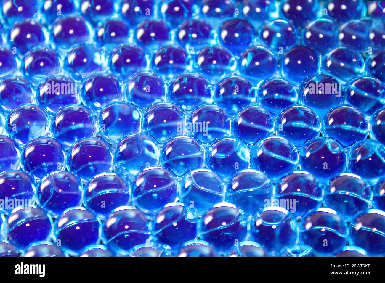 Water blue gel balls. Polymer gel. Silica gel. Balls of blue hydrogel