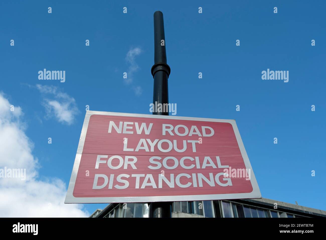 red and white sign indicating a new road layout to allow covid 19 related social distancing, richmond, surrey, england Stock Photo