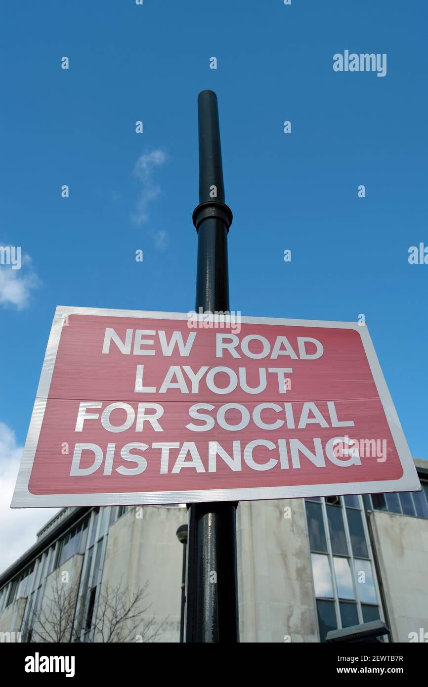 red and white sign indicating a new road layout to allow covid 19 related social distancing, richmond, surrey, england Stock Photo