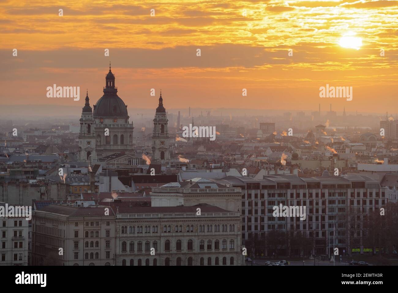 Budapest panoramic cityscape with St Stehen basilica towers and amazing sunrise lights in capital city of Hungary. Stock Photo
